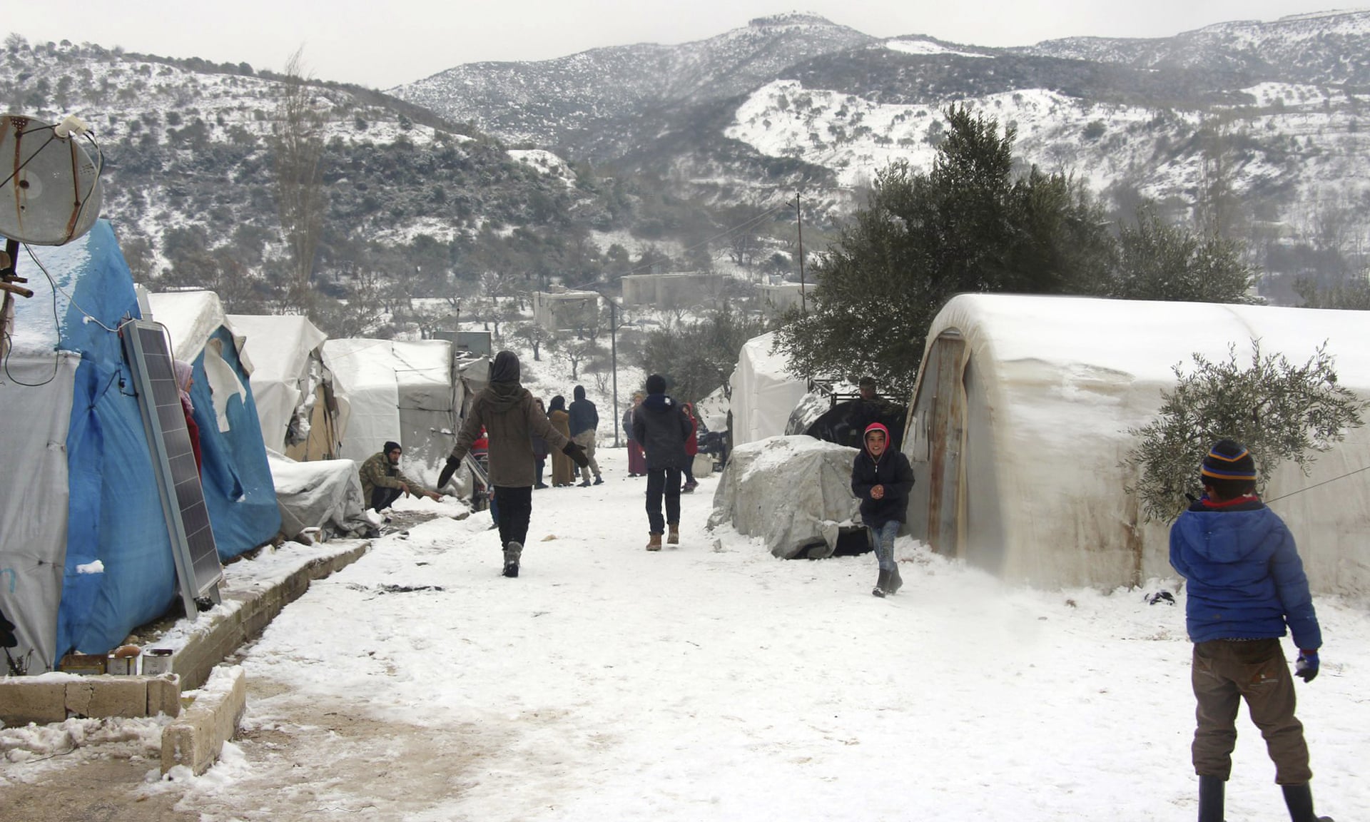 Families trapped by Assad’s assault on Idlib fight to survive in the snow